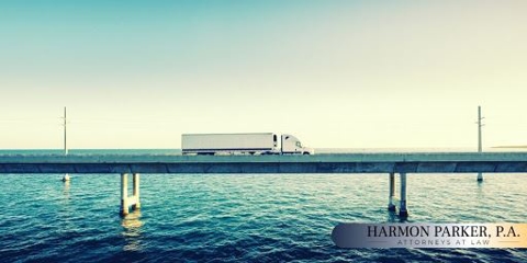 Truck Driving Over Bridge